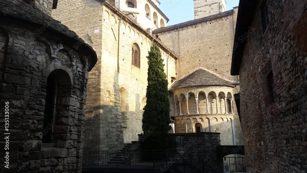 Bergamo - Old city (Citta Alta). One of the beautiful city in Italy. Lombardia. The bell tower and the dome of the Cathedral called Santa Maria Maggiore, north wing Bergamo - Old city (Citta Alta). One of the beautiful city in Italy. Lombardia. The bell tower and the dome of the Cathedral called Santa Maria Maggiore, north wing