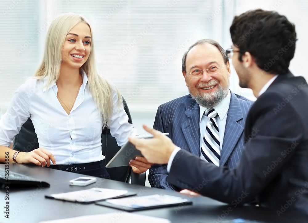business team is working with financial documents at the office business team is working with financial documents at the office