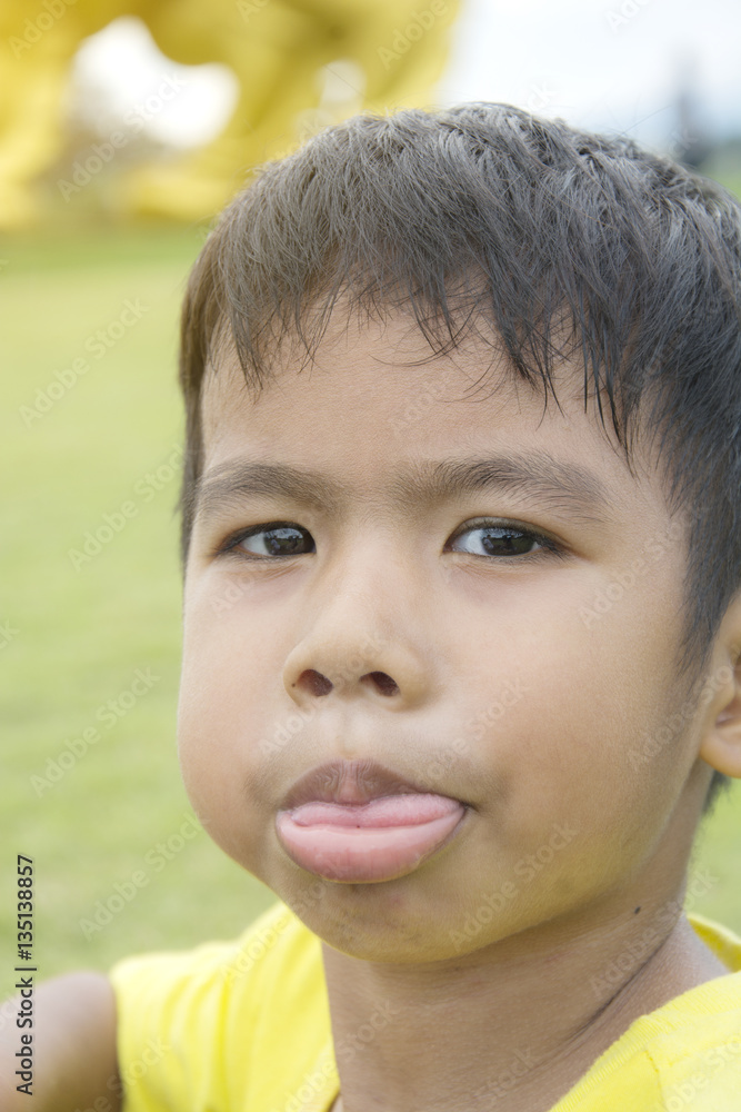 Child boy five years old act like a joke to mommy, put on his's tongue, Child boy five years old act like a joke to mommy, put on his's tongue,