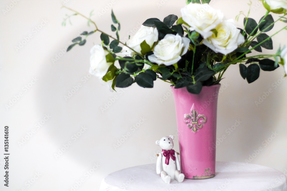 white roses in a vase white roses in a vase