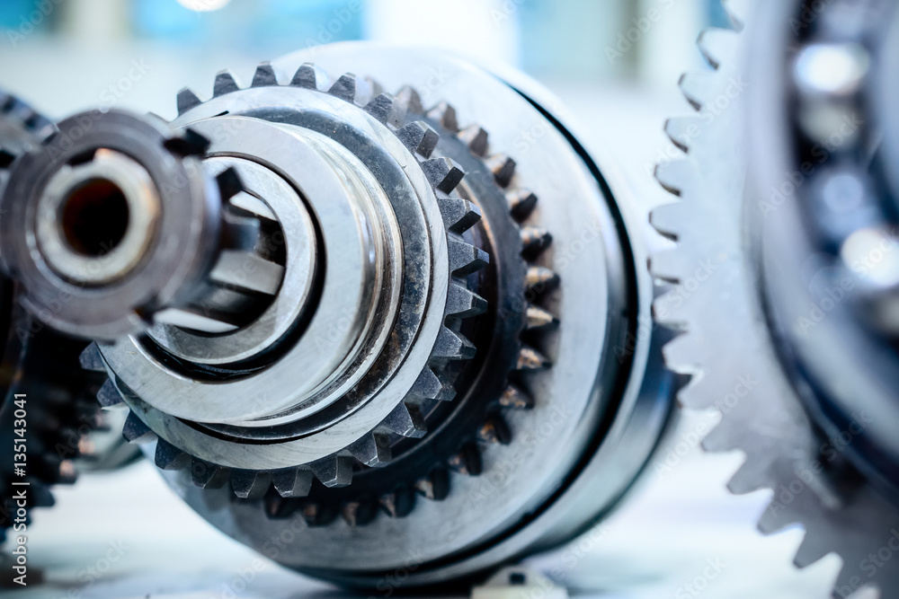 Metal shaft with gears and spline teeth. Metal shaft with gears and spline teeth.