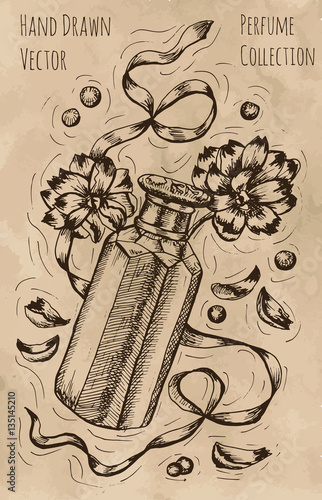Vintage still life with perfume bottle, ribbon and flowers