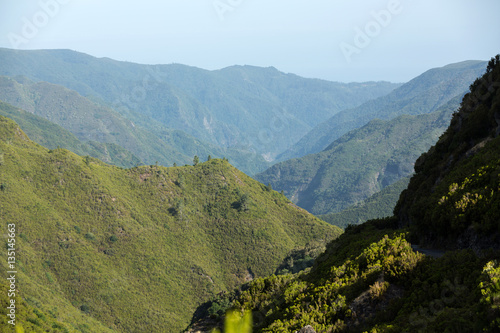 Picturesque aerial panorama of mountains and rainforest hills on Madeira island, Portugal.