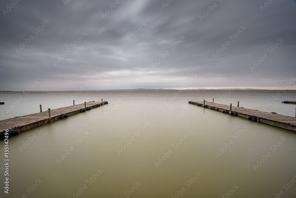 Storm over Albufera with 2 piers, Valencia