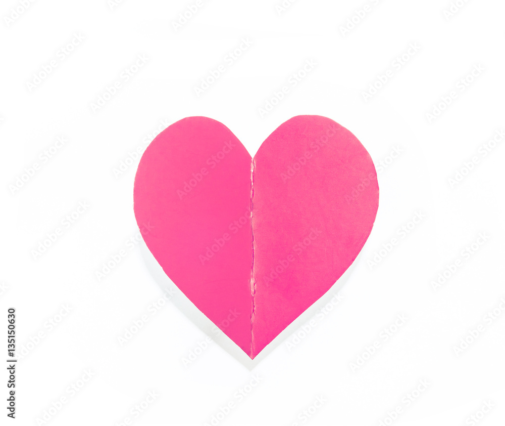 Pink paper heart with shadow isolated on white background
