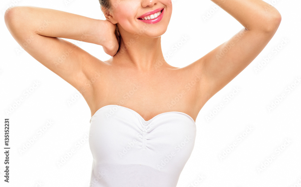 Beautiful young woman holding her arms up and showing clean unde Beautiful young woman holding her arms up and showing clean unde