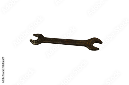 Old wrench isolated on white