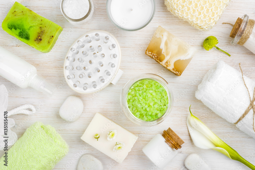 Above view of spa wellness products on wooden texture background Above view of spa wellness products on wooden texture background
