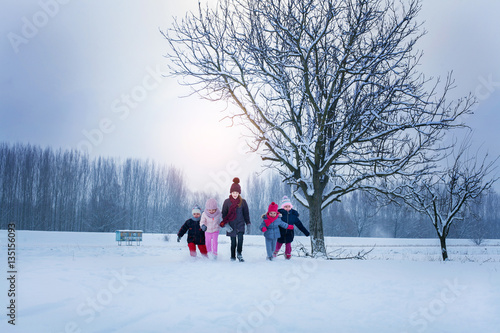 Group of children in the snow.