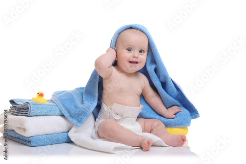 Cute baby with towels on wh...