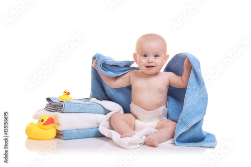 Cute baby with towels and r...