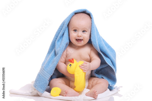 Cute baby with towels and r...