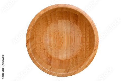 Top view of wooden bowl isolated on white