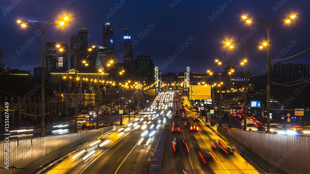 night traffic on urban thoroughfare