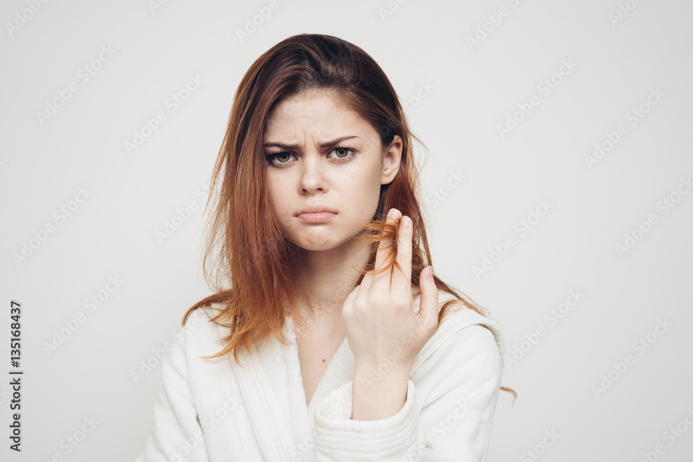 woman on a white background distressed hair woman on a white background distressed hair