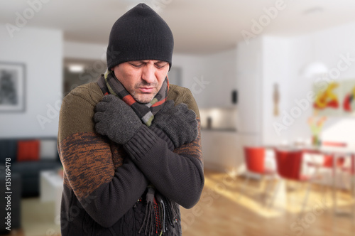 Carta da parati Portrait of sick man shivering from cold