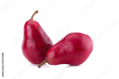 Red pears over white background.