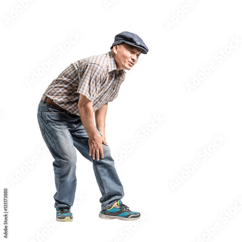 Portrait of a mature man with knee pain. Isolated full body on w