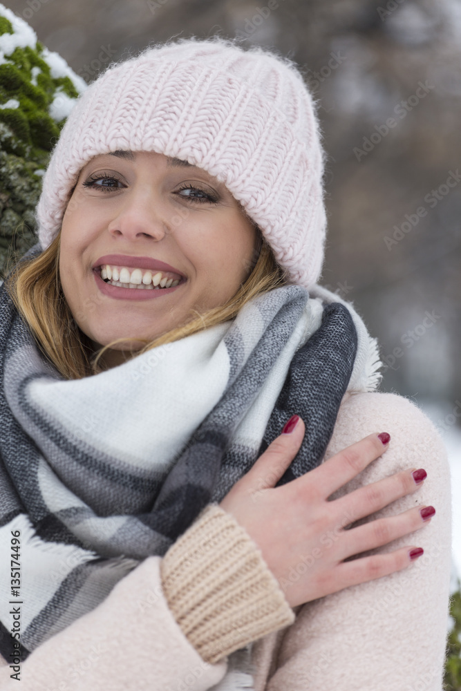 Portrait of a beautiful blonde woman in in the snow Portrait of a beautiful blonde woman in in the snow