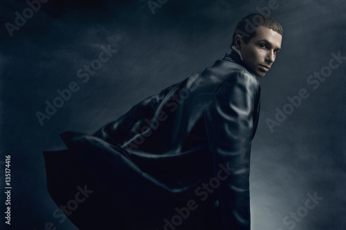 Fashion of young handsome man in leather coat.