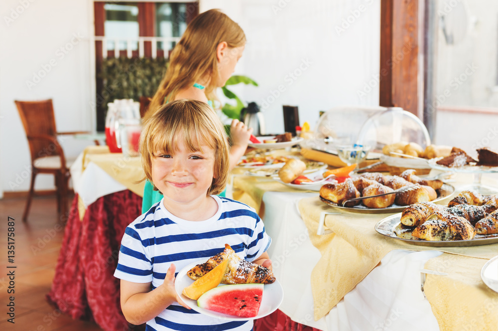 Kids choosing breakfast in restaurant Kids choosing breakfast in restaurant