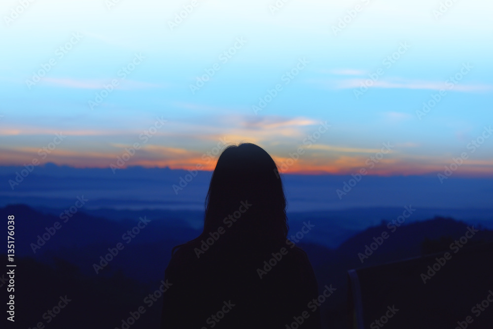 Woman with  watching a mountain view