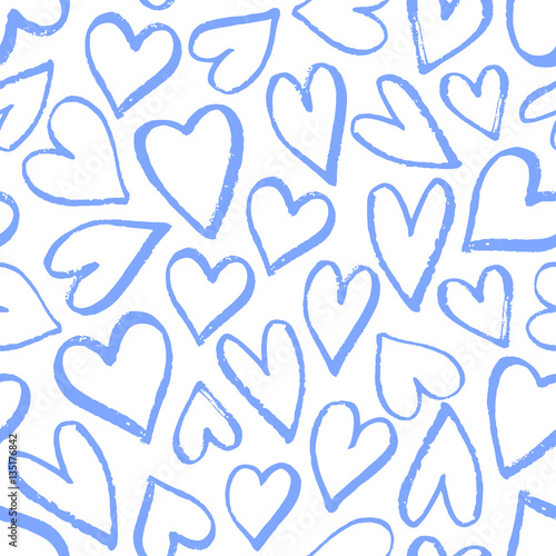 Seamless pattern with hand drawn hearts in blue on white background.