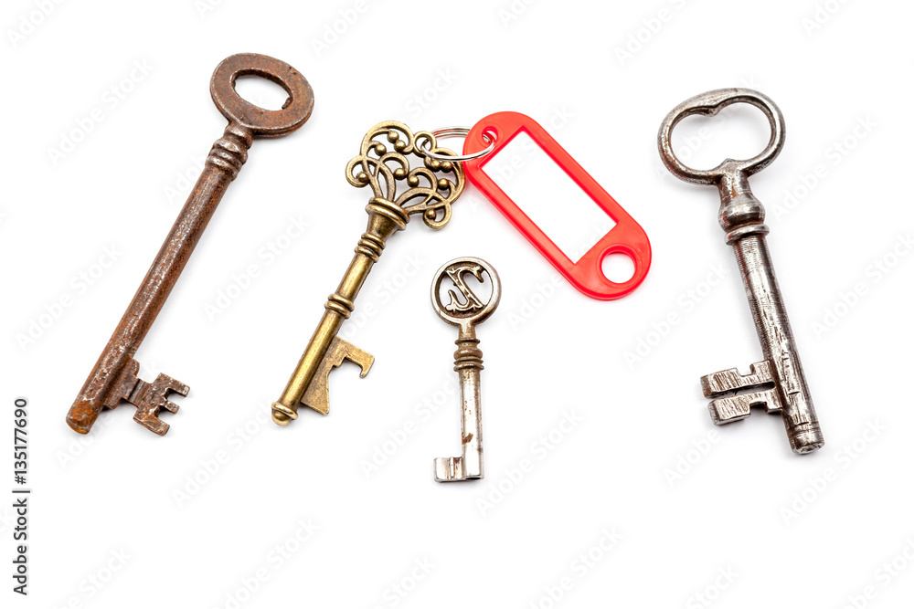 an antique key with label