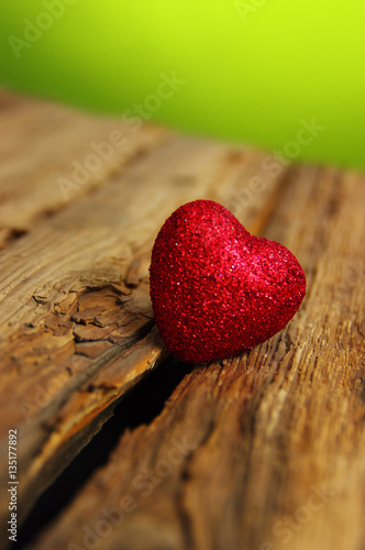Red heart on a wood