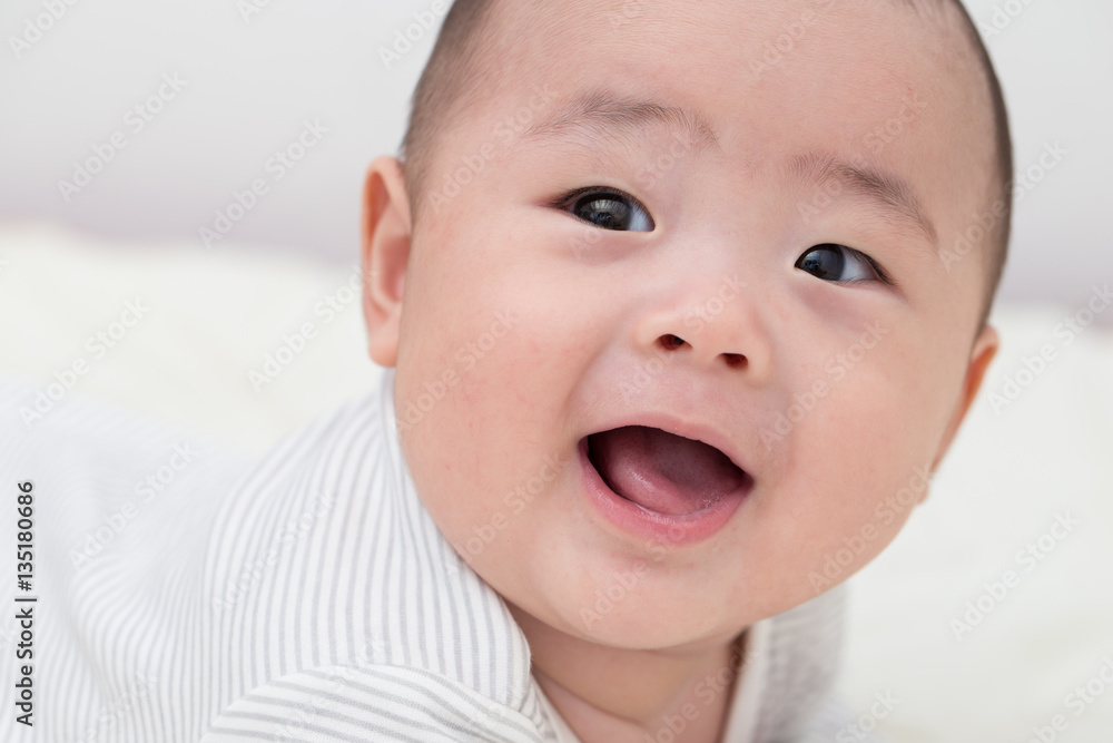 Portrait adorable baby smiling and surprise Portrait adorable baby smiling and surprise
