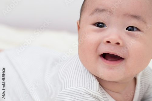 Portrait adorable baby smiling and surprise
