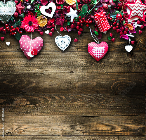 Fototapeta Naklejka Na Ścianę i Meble -  Valentine's Day Background with love themed elements like cotton and paper hearts