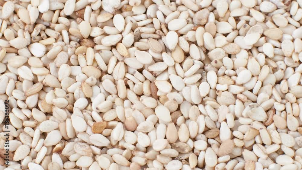 Sesame seeds heap texture view from the top still image and zoom in Sesame seeds heap texture view from the top still image and zoom in