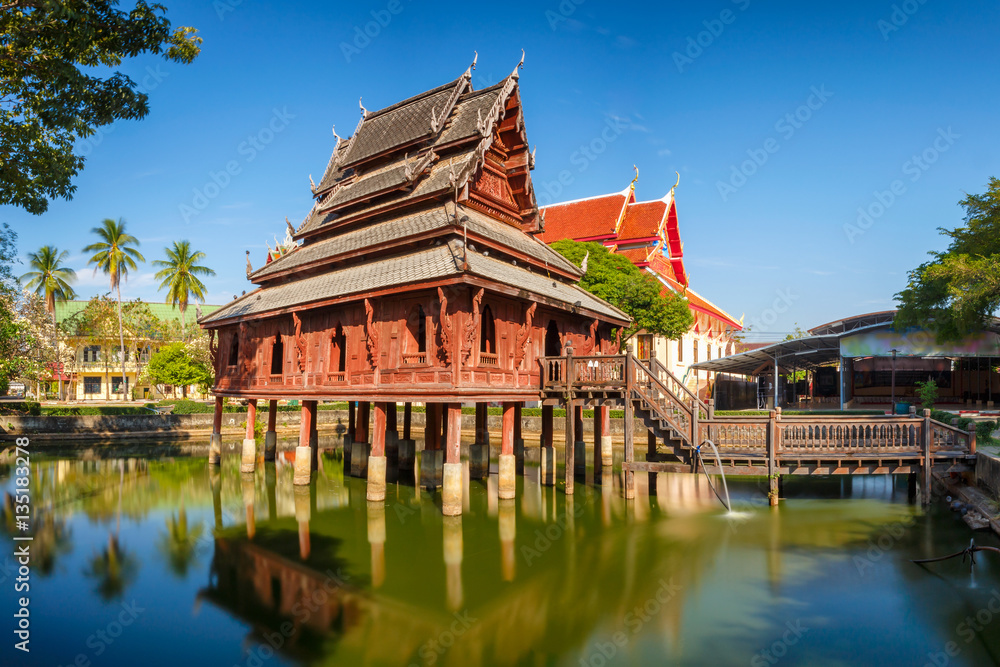 The library on stilts in Wat Thung Si Muang temple in Ubon Ratchatani in Isan, north eastern Thailand.