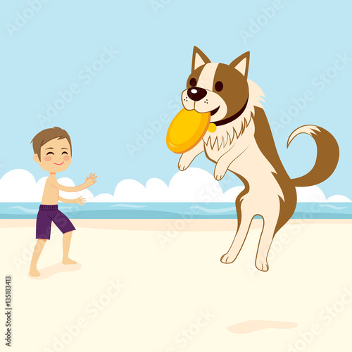 Boy playing with dog catchi...
