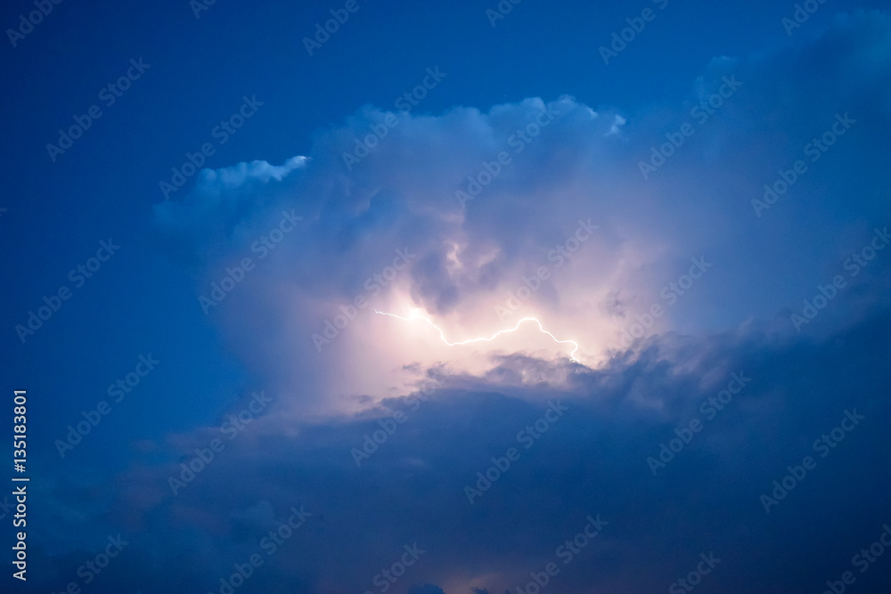 Lightnings in storm clouds. Peals of a thunder and the sparkling lightnings in clouds Lightnings in storm clouds. Peals of a thunder and the sparkling lightnings in clouds