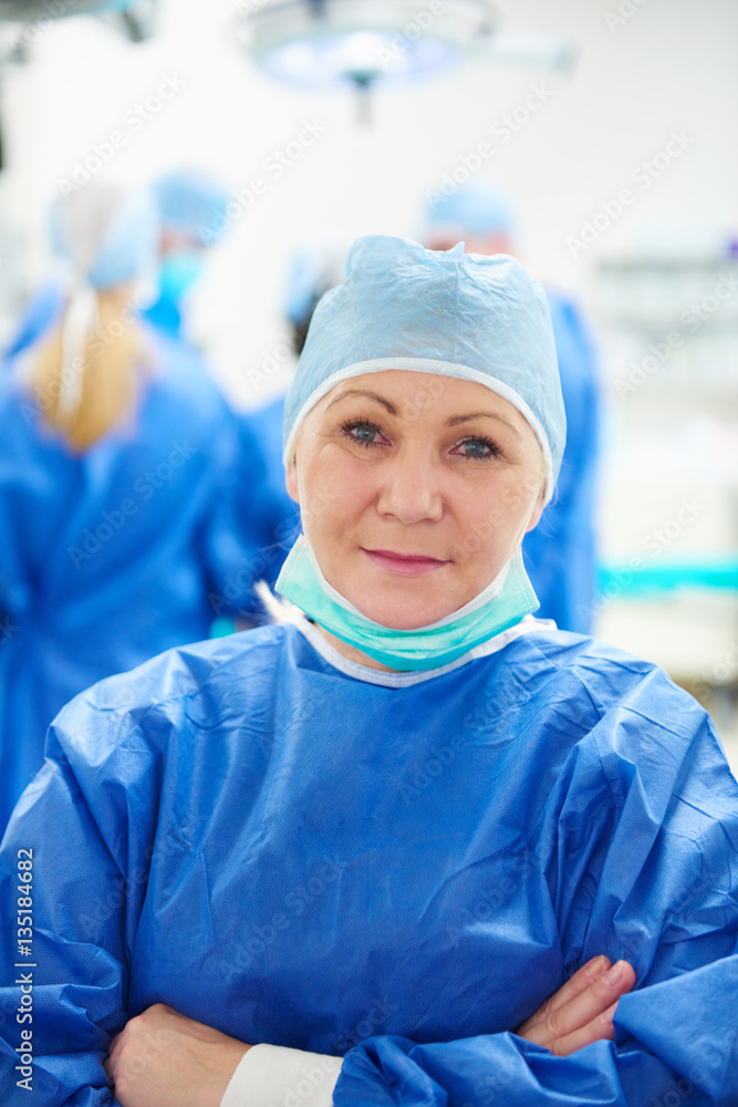 Portrait of mature doctor in surgical uniform Portrait of mature doctor in surgical uniform