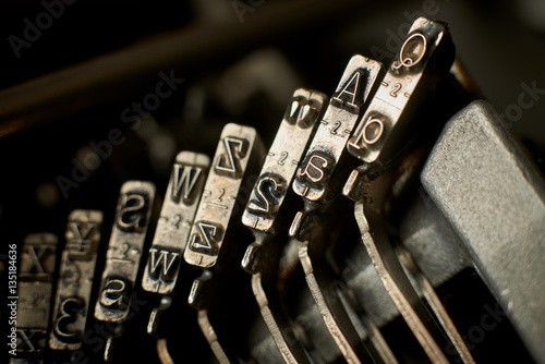 From A to Z closeup of old typewriter letters