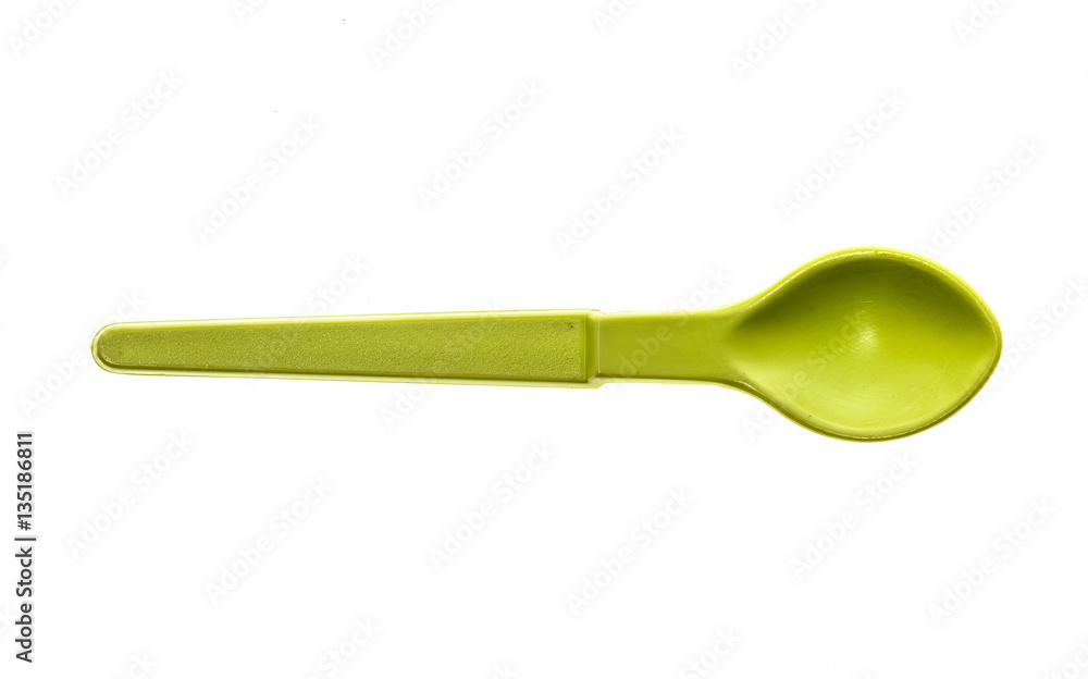 Close-up of a plastic tableware spoon for babies and children. Close-up of a plastic tableware spoon for babies and children.