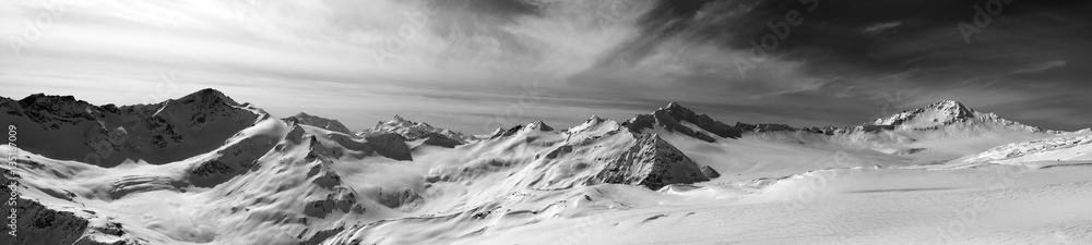 Obraz premium Black and white panorama of Caucasus Mountains in snow winter ev