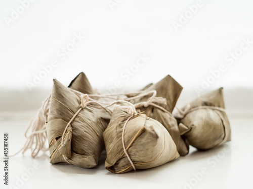Glutinous rice wrapped in banana leaves