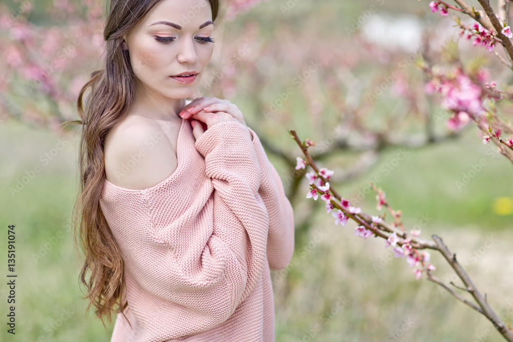 Beautiful woman in a spring garden Beautiful woman in a spring garden