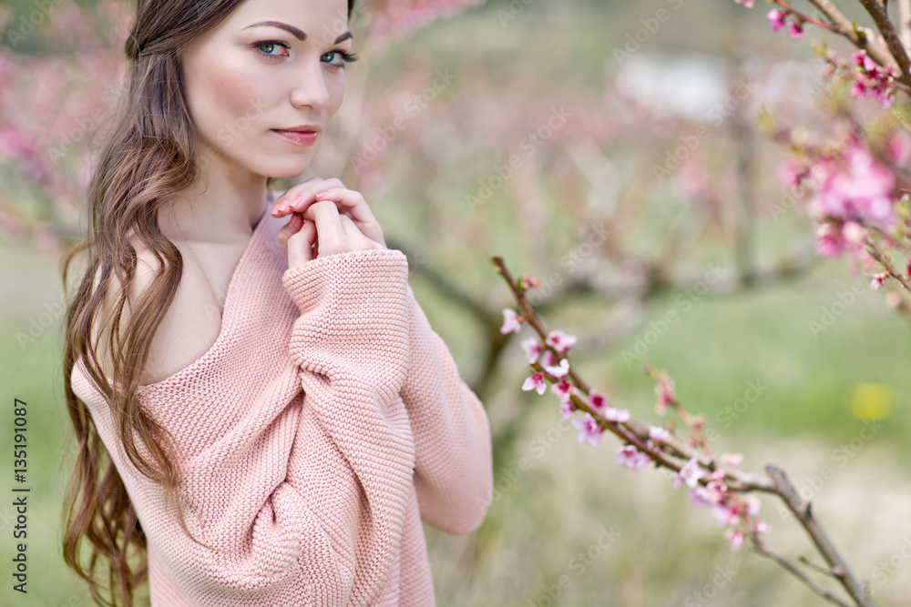 Beautiful woman in a spring garden Beautiful woman in a spring garden