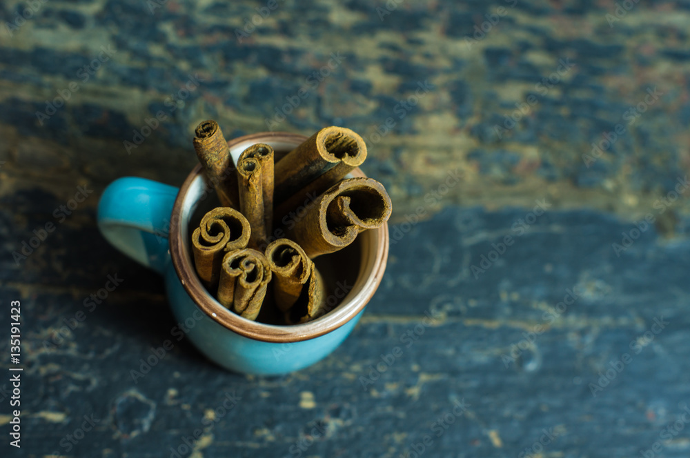 Cinnamon spice on wooden table Cinnamon spice on wooden table