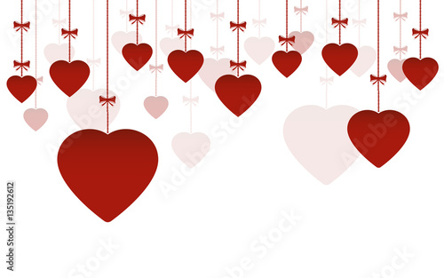 Happy Valentine's Day ornaments hanging with red hearts