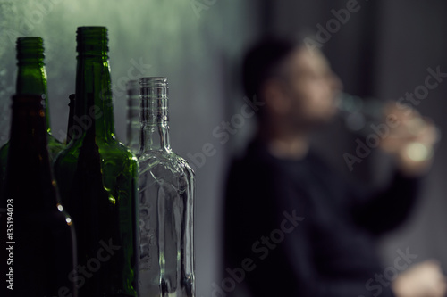 Empty bottles of alcohol photo