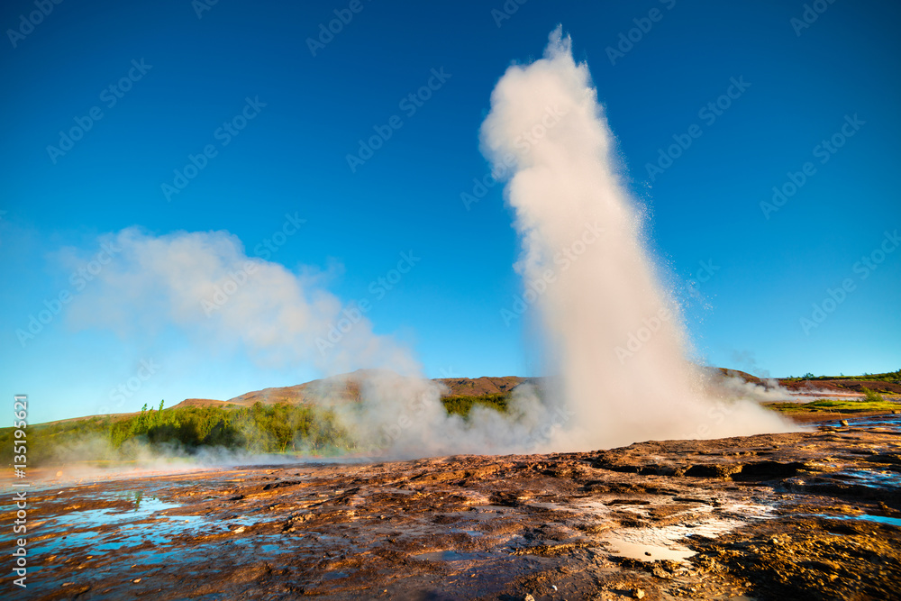 Erupting of the Great Geysir lies in Haukadalur valley