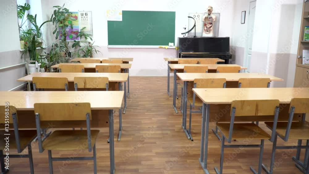 empty school class with Chairs ,tables and blackboard inside empty school class with Chairs ,tables and blackboard inside