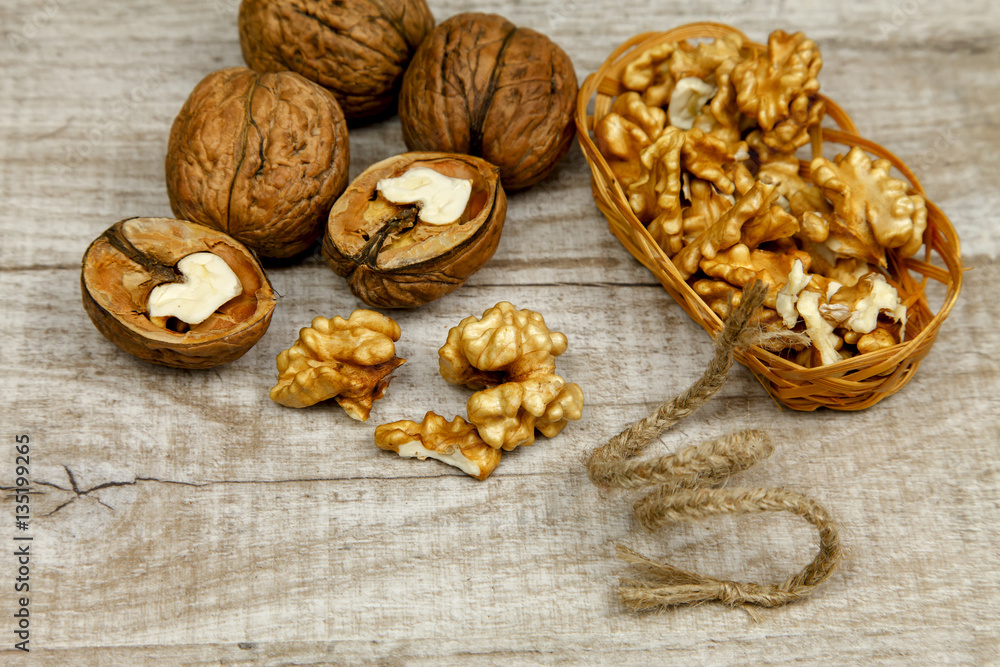Whole walnuts and kernels on the table