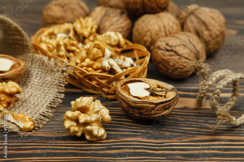 Whole walnuts and kernels on the table